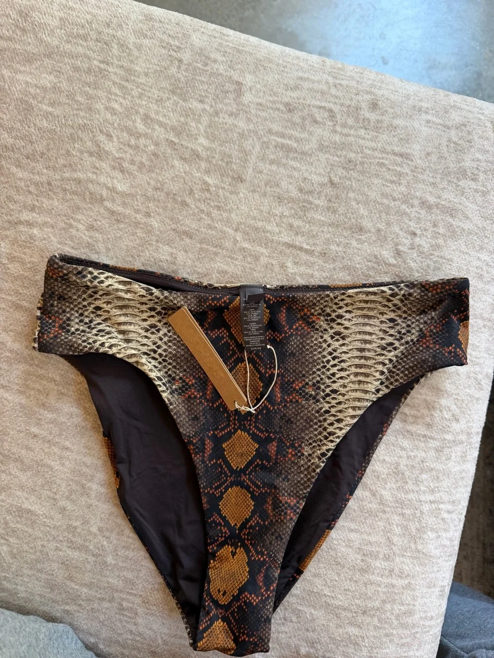 SKIMS Snake-Print Bikini Bottoms in Brown and Black with Orange Accents